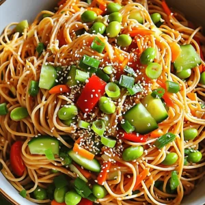 For the base of the salad, use: - 8 oz. whole wheat spaghetti or soba noodles These noodles give the dish its chewy texture. They soak up the dressing well and add a hearty feel. The fresh vegetables bring color and crunch. You will need: - 1 red bell pepper, julienned - 1 cucumber, julienned - 1 carrot, shredded - 3 green onions, sliced - ½ cup cooked edamame (shelled) These veggies not only add flavor but also provide nutrients and a vibrant look. The dressing ties everything together. Here’s what you need: - ¼ cup soy sauce (or tamari for gluten-free) - 2 tablespoons sesame oil - 1 tablespoon rice vinegar - 1 tablespoon chili paste (adjust to taste) - 1 teaspoon honey or maple syrup - 1 tablespoon fresh ginger, grated - 1 garlic clove, minced - Salt and pepper to taste This mix of ingredients gives the salad its spicy and savory edge. Adjust the chili paste for your spice level. Each bite bursts with flavor, making this dish a standout. Start by boiling water in a large pot. Add a good amount of salt to the water. Once it boils, add 8 oz. of spaghetti or soba noodles. Cook the noodles until they are al dente, following package directions. This usually takes about 8 to 10 minutes. Drain the noodles and rinse them under cold water. This stops the cooking process and keeps the noodles firm. While the noodles cook, wash and prepare your vegetables. Take one red bell pepper and julienne it into thin strips. Then, julienne one cucumber and shred one carrot. Slice three green onions and set them aside. These fresh veggies add color and crunch to your salad. In a small bowl, whisk together the dressing. Combine ¼ cup of soy sauce, 2 tablespoons of sesame oil, and 1 tablespoon of rice vinegar. Add 1 tablespoon of chili paste for spice, adjusting to your taste. Then, mix in 1 teaspoon of honey or maple syrup for sweetness, along with 1 tablespoon of grated fresh ginger and 1 minced garlic clove. This dressing brings all the flavors together. In a large mixing bowl, combine the cooled noodles with your prepared vegetables. Add the julienned bell pepper, cucumber, shredded carrot, ½ cup of cooked edamame, and sliced green onions. Pour your dressing over the top. Toss gently until everything is well mixed and coated in the dressing. Now, sprinkle ¼ cup of toasted sesame seeds over the salad. Give it another gentle toss to incorporate the seeds. This step adds a nutty flavor and a delightful crunch to your dish. For the best taste, let your salad chill in the fridge for 15 to 30 minutes. This allows the flavors to blend nicely. When ready to serve, scoop the salad into a large bowl or individual plates. You can garnish with extra sesame seeds and green onion slices for a vibrant look. Enjoy your fresh and colorful Spicy Sesame Noodle Salad! To control the heat, start with a small amount of chili paste. You can add more later if you want more spice. Mix the dressing and taste it. If you find it too mild, add another half teaspoon of chili paste. Remember, you can always add more, but you can’t take it out! I love serving this salad in a big bowl. It looks bright and fresh. You can also serve it in individual plates for a fancy touch. Top each serving with extra sesame seeds and green onion slices. For added crunch, sprinkle some crushed peanuts on top! Make this salad ahead of time for busy days. Cook the noodles and chop the veggies the night before. Store them in the fridge. Keep the dressing separate until you’re ready to serve. This way, the noodles and veggies stay fresh and crisp. Remember to chill the salad for at least 15 to 30 minutes before serving. This helps the flavors mix well! {{image_2}} You can boost the salad with proteins. Try adding cooked chicken or tofu. Both add great taste and texture. Shrimp also works well if you want seafood. For a plant-based option, add chickpeas or black beans. These options make the dish more filling. Feel free to swap in different veggies. Broccoli or snap peas add a nice crunch. Shredded cabbage gives a fresh taste. You can also use radishes for a peppery kick. Experiment with your favorite vegetables. They can change the flavor and look of the salad. Want to change the flavor? Try using peanut butter instead of sesame oil. This gives a nutty twist. You can also add lime juice for a citrusy zing. Fresh herbs like cilantro or mint can add brightness. Each change gives the salad a unique spin. To keep your Spicy Sesame Noodle Salad fresh, store it in an airtight container. Place it in the fridge. This salad stays good for about 3 days. Make sure to give it a quick toss before serving again. The flavors meld together nicely over time. I do not recommend freezing this salad. The noodles and veggies do not freeze well. Freezing can make the noodles mushy. It also changes the texture of the fresh vegetables. For the best taste, enjoy it fresh. If you need to reheat the salad, do it gently. Place it in a pan over low heat. Stir it often to warm it up without cooking it further. If you want, you can add a splash of soy sauce to freshen the flavors. Enjoy the salad cold for a refreshing meal! To make your salad less spicy, reduce the chili paste. Start with just half a tablespoon. You can also add more honey or maple syrup to balance the heat. If you want extra flavor, add more sesame oil or soy sauce. Taste as you go, and adjust until you get the right balance. Yes, you can use gluten-free noodles. Soba noodles are a good choice if they are 100% buckwheat. Rice noodles also work well. Just make sure to cook them according to the package instructions for best results. This salad is packed with nutrients. Whole wheat noodles offer fiber and protein. Vegetables like bell peppers and cucumbers are rich in vitamins. Edamame adds protein and healthy fats. The sesame seeds provide healthy omega-3 fatty acids. It’s a balanced dish full of flavor and health benefits. Spicy Sesame Noodle Salad lasts about 3 to 5 days in the fridge. Be sure to store it in an airtight container. The flavors will meld together as it sits, making it even tastier. Yes, you can make this salad in advance. Prepare it a day ahead for a quick meal. Just remember to keep the salad chilled in the fridge. You may want to toss it again before serving to mix the flavors. This blog post covered how to make a tasty Spicy Sesame Noodle Salad. We discussed the key ingredients, including noodles, fresh veggies, and dressing components. You learned step-by-step instructions for cooking and combining everything. We also shared tips for spice levels and meal prep. Variations let you add proteins or different flavors. Finally, we talked about storage and answered common questions. Enjoy this easy and healthy dish anytime, and feel free to get creative!