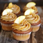 - 1 ½ cups all-purpose flour - 1 teaspoon baking powder - ½ teaspoon baking soda - ½ teaspoon salt - 1 teaspoon ground cinnamon - ½ teaspoon ground nutmeg - ½ teaspoon ground ginger - ½ cup unsalted butter, softened - 1 cup granulated sugar - 2 large eggs - 1 teaspoon vanilla extract - ¾ cup apple cider - 1 cup peeled and diced apples (like Granny Smith or Honeycrisp) - ½ cup unsalted butter - 1 cup brown sugar - ¼ cup heavy cream - 1 teaspoon vanilla extract - 2 cups powdered sugar You can swap all-purpose flour with whole wheat flour for a healthier option. If you want less sugar, use a sugar substitute. Applesauce can replace butter for a lighter cupcake. For those who can't have eggs, a flaxseed mix works well. Use dairy-free butter and cream for a vegan frosting. If you cannot find apple cider, try using apple juice instead. Start by preheating your oven to 350°F (175°C). This step ensures even baking. Line a muffin tin with cupcake liners. This keeps your cupcakes from sticking. In a medium bowl, whisk together these dry ingredients: - 1 ½ cups all-purpose flour - 1 teaspoon baking powder - ½ teaspoon baking soda - ½ teaspoon salt - 1 teaspoon ground cinnamon - ½ teaspoon ground nutmeg - ½ teaspoon ground ginger Mix until well combined. This blend gives the cupcakes their spiced flavor. In a large bowl, cream together: - ½ cup unsalted butter, softened - 1 cup granulated sugar Beat until light and fluffy. This step adds air for a soft texture. Add in two large eggs, one at a time. Mix well after each addition. Stir in 1 teaspoon of vanilla extract. This adds depth to the flavor. Gradually add the dry mixture to the wet ingredients. Alternate with ¾ cup of apple cider. Mix until just combined. Be careful not to overmix. Gently fold in 1 cup of peeled and diced apples. Use Granny Smith or Honeycrisp for a nice tartness. Ensure they are evenly distributed in the batter. Divide the batter among the liners. Fill each about two-thirds full to allow for rising. Bake for 18-20 minutes. Check for doneness by inserting a toothpick in the center. It should come out clean. Once baked, let the cupcakes cool in the pan for 5 minutes. Then, transfer them to a wire rack to cool completely. This prevents soggy bottoms. For the caramel frosting, melt ½ cup of unsalted butter in a saucepan over medium heat. Stir in 1 cup of brown sugar and ¼ cup of heavy cream. Stir continuously until it begins to boil. Once boiling, let it cook for 2 minutes. Remove from heat and stir in 1 teaspoon of vanilla extract. This makes the frosting rich and flavorful. Allow the caramel mixture to cool slightly. Gradually whisk in 2 cups of powdered sugar until smooth and creamy. This gives the frosting a perfect texture. Once the cupcakes are cool, frost them generously with the caramel frosting. Enjoy the delightful blend of flavors! To make perfect spiced apple cider cupcakes, follow these tips: - Use fresh spices: Fresh spices enhance the flavor. Old spices lose their punch. - Room temperature ingredients: Make sure your butter and eggs are at room temperature. This helps them mix well. - Don’t overmix: Mix just until combined. Overmixing can make cupcakes tough. - Fill liners correctly: Fill each cupcake liner about two-thirds full. This allows room for rising. - Check doneness: Use a toothpick to test for doneness. It should come out clean. Creating a smooth caramel frosting is simple with these tricks: - Use medium heat: Cook the caramel over medium heat to prevent burning. - Stir constantly: Keep stirring as it cooks. This helps blend the butter, sugar, and cream. - Cool before mixing: Let the caramel cool slightly before adding powdered sugar. This helps achieve a creamy texture. - Adjust thickness: If frosting is too thick, add a splash of cream. If too thin, add more powdered sugar. Make your cupcakes shine with these ideas: - Dust with cinnamon: A light sprinkle of cinnamon adds visual flair. - Top with apple slices: A small slice of apple on each cupcake is a lovely touch. - Drizzle with caramel: A drizzle of caramel sauce creates a decadent look. - Serve on a beautiful platter: A nice platter adds to the overall presentation. - Pair with drinks: Enjoy these cupcakes with spiced tea or hot cider for a cozy treat. {{image_2}} If you want to switch up the frosting, try cream cheese frosting. It adds a tangy taste that pairs well with the sweetness of the cupcakes. Another option is whipped cream. It creates a light and airy texture. You could also use chocolate ganache. This rich frosting brings a bold flavor. Each option offers a unique twist to the classic caramel frosting. You can change the flavors in these cupcakes to suit your taste. Try adding a splash of orange or lemon zest for a citrus twist. You could also mix in some chopped nuts for crunch. Walnuts or pecans work great. For a spicier kick, add more ginger or a pinch of cloves. Even swapping out the apples for pears can create a fun new flavor. For those with dietary needs, you can make simple swaps. Use gluten-free flour to make these cupcakes gluten-free. Replace the sugar with a sweetener like maple syrup for a healthier option. If you need a dairy-free treat, use coconut oil instead of butter and a dairy-free milk. These changes keep the cupcakes tasty while accommodating different diets. You can store your spiced apple cider cupcakes in an airtight container. Keep them at room temperature for up to three days. If you want to keep them longer, place them in the fridge. Chilling helps keep the freshness and flavor intact. Just remember to bring them back to room temp before serving for the best taste. To freeze the cupcakes, let them cool completely first. Wrap each cupcake tightly in plastic wrap. Then place them in a freezer-safe bag or container. They can stay frozen for up to three months. When you are ready to enjoy them, thaw them in the fridge overnight. This keeps them moist and delicious. Store leftover caramel frosting in an airtight container in the fridge. It will last about a week. When you want to use it again, let it sit at room temperature for about 30 minutes. If it hardens, you can gently rewhip it to make it smooth again. Avoid leaving it out too long, as it can spoil quickly. You can tell when the cupcakes are done by inserting a toothpick into the center. If it comes out clean, they are ready. The tops should look golden and slightly springy. Overbaking can make them dry, so keep an eye on them as they bake. Yes, you can make the cupcakes ahead of time. Once cooled, store them in an airtight container. They will stay fresh for up to three days. You can frost them just before serving for the best texture and flavor. If you don’t have apple cider, you can use apple juice or a mix of water and lemon juice. This will give you a similar flavor. However, the spice notes may not be as strong, so consider adding a bit more cinnamon or nutmeg for depth. Caramel frosting can last about one week in the fridge. Store it in an airtight container. Before using, let it sit at room temperature to soften. You can also rewhip it for a smooth texture before frosting your cupcakes. You learned about the best ingredients for cupcakes and caramel frosting. I shared tips for baking perfect treats and how to adapt recipes. You also found storage info to keep them fresh. Remember, baking is fun and allows you to be creative. Use the variations to make your cupcakes unique. Enjoy every bite you create, and share your tasty results!