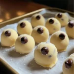 - 1 cup all-purpose flour (heat-treated) - ½ cup unsalted butter, softened - ½ cup brown sugar, packed - ¼ cup granulated sugar - 2 teaspoons vanilla extract - 1 tablespoon milk (or dairy-free alternative) - ½ cup mini chocolate chips - ¼ teaspoon salt You must heat-treat the flour to keep it safe. Raw flour can hold germs. Heating it kills any harmful bacteria. This makes it safe to eat the dough. To heat-treat flour, preheat your oven to 350°F (175°C). Spread the flour on a baking sheet. Bake it for 5 to 7 minutes. Let the flour cool completely before using it. This step is key for safe and tasty cookie dough bites! Heat treating the flour First, we need to heat-treat the flour. Preheat your oven to 350°F (175°C). Spread 1 cup of all-purpose flour on a baking sheet. Bake it for 5-7 minutes. This step kills any harmful bacteria. Let the flour cool completely before using it. Mixing the butter and sugars Next, grab a large mixing bowl. Add ½ cup of softened unsalted butter, ½ cup of packed brown sugar, and ¼ cup of granulated sugar. Use a mixer to cream these ingredients together. Beat them until the mixture is light and fluffy, about 2-3 minutes. Adding flavorings Now it’s time to add some flavor! Mix in 2 teaspoons of vanilla extract and 1 tablespoon of milk. Continue to beat until everything is smooth and well blended. Incorporating dry ingredients Gradually add the heat-treated flour and ¼ teaspoon of salt to the butter mixture. Mix just until the dry ingredients are incorporated. Be careful not to overmix, or your bites may become tough. Folding in chocolate chips Then, gently fold in ½ cup of mini chocolate chips. Make sure they are evenly distributed throughout the dough. This step adds that sweet chocolatey goodness! Shaping and chilling the dough Use a tablespoon or small cookie scoop to portion out the dough. Roll each portion into a ball. Place them on a parchment-lined baking tray. To help them firm up, chill the tray in the refrigerator for about 30 minutes. Now you have delicious edible sugar cookie dough bites ready to enjoy! To get the best texture in your dough bites, do not overmix. Overmixing can make your bites tough. Mix just until you see no dry flour. This keeps the dough soft and chewy. Chilling the dough is also key. After shaping the bites, put them in the fridge for about 30 minutes. This helps them firm up. A cold dough holds its shape better when you eat it. You can make your dough bites even more fun with add-ins. Try nuts, like chopped walnuts or pecans. You can also try different chocolates, like dark or white chocolate chips. If you want to switch things up, think about flavor variations. Peanut butter or caramel can add a new twist. Just mix them in with the butter and sugars for a tasty change. {{image_2}} You can change the flavor of your cookie dough bites easily. While vanilla is classic, other extracts work great too. Try almond or coconut extract for a twist. A little goes a long way! You can also make seasonal flavors. For fall, add pumpkin spice to your dough. For winter, peppermint extract gives a fresh taste. These flavors add fun and excitement to every bite! If you need gluten-free options, substitute regular flour with a gluten-free blend. Ensure the blend has a fine texture for the best results. For those who need dairy-free treats, swap out the butter with coconut oil or a dairy-free butter blend. You can also use almond milk or oat milk in place of regular milk. These changes keep your treats tasty and safe for everyone. To keep your edible cookie dough bites fresh, place them in an airtight container. Make sure they are completely cool before you store them. This helps to lock in moisture and flavor. You can store them in the fridge for up to a week. If you want to save them for later, freezing is a great option. To freeze, arrange the cookie dough bites on a baking sheet. Make sure they do not touch. Freeze them for about an hour until firm, then transfer them to a freezer-safe bag or container. They will keep well in the freezer for about three months. In the fridge, these cookie dough bites last about one week. After that, they may start to lose taste and texture. If you notice any changes in smell or appearance, it's best to discard them. Signs of spoilage include any off smell or a dry texture. You want to enjoy these treats at their best, so always check before indulging! Yes, you can eat cookie dough. However, you need to make sure it is safe. The main concern is raw flour and eggs. In this recipe, we heat-treat the flour. This kills harmful bacteria. We also do not use eggs. This makes the dough safe to eat. Enjoy these bites without worry! You can substitute butter with several options. Here are some ideas: - Coconut oil - Vegetable shortening - Applesauce (for a lower fat option) - Nut butters (like almond or peanut butter) Each option gives a different taste and texture. Choose what you like best! To tell if the cookie dough is done, check its texture. It should be smooth and soft, but not too sticky. If you can roll it into a ball easily, it’s ready. Make sure to mix just until combined. Overmixing can make it tough. This blog post covered how to make edible cookie dough bites safely and deliciously. We discussed the key ingredients, especially the need for heat-treated flour. You learned step-by-step instructions and valuable tips for achieving the perfect texture. There are many flavor variations and customization options to explore. Lastly, we shared how to store and maintain the freshness of your treats. Now you're ready to enjoy safe, tasty cookie dough bites that you can make at home!