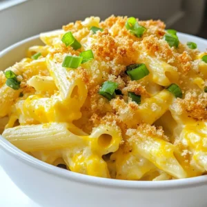 - 8 oz (225 g) pasta of your choice (penne or fusilli works great) - 4 oz (115 g) cream cheese, softened - 1 cup shredded sharp cheddar cheese - 1 cup shredded mozzarella cheese - 1-2 fresh jalapeños, diced (remove seeds for less heat) - 2 tablespoons olive oil - 3 cloves garlic, minced - 1/2 cup heavy cream - 1/2 teaspoon smoked paprika - 1/4 teaspoon salt - 1/4 teaspoon black pepper - 1/2 cup breadcrumbs (for topping, optional) - Chopped green onions for garnish When making creamy jalapeño popper pasta, you can play with the ingredients. For the pasta, choose your favorite type. Penne or fusilli works best, but spaghetti or shells can also work. If you want a lighter dish, swap cream cheese for Greek yogurt. It will change the flavor slightly but keeps it creamy. For the cheese, sharp cheddar and mozzarella are my go-to choices. However, you can use pepper jack for more spice. If you prefer a milder option, try Monterey Jack. Fresh jalapeños bring the heat, but you can use pickled jalapeños for a different flavor. Just adjust the amount to your spice level. You will need a few simple tools for this dish: - A large pot for boiling pasta - A large skillet for cooking the sauce - A wooden spoon or spatula for mixing - A measuring cup and spoons for accuracy - A knife and cutting board for chopping jalapeños and garlic - An oven-safe skillet if you want to broil the topping These tools help make cooking smooth and easy. Enjoy the process, and let your kitchen come alive! {{ingredient_image_1}} First, grab a large pot. Fill it with water and add salt. Bring the water to a boil. Once it boils, add 8 ounces of pasta. You can use penne or fusilli. Cook it until it is al dente, which means it is firm but cooked. This usually takes about 8 to 10 minutes. After cooking, drain the pasta and set it aside. Next, take a large skillet and heat 2 tablespoons of olive oil over medium heat. Chop 1 to 2 fresh jalapeños and add them to the skillet. If you want less heat, remove the seeds. Add 3 minced garlic cloves. Cook this mix for about 2 to 3 minutes. You want it to smell great and become soft. Now, lower the heat to medium-low. Add 4 ounces of softened cream cheese to the skillet. Stir until it melts and becomes creamy. Gradually pour in 1/2 cup of heavy cream. Add 1/2 teaspoon of smoked paprika, 1/4 teaspoon of salt, and 1/4 teaspoon of black pepper. Whisk everything together until it is smooth. Once the sauce is creamy, it’s time to add the cheeses. Stir in 1 cup of shredded sharp cheddar cheese and 1 cup of shredded mozzarella cheese. Mix until all the cheese melts into the sauce. Now, add the cooked pasta to the skillet. Toss everything until the pasta is fully coated with the creamy sauce. If you want a crunchy topping, grab a small bowl. Mix 1/2 cup of breadcrumbs with a drizzle of olive oil and a pinch of salt. Spread the breadcrumb mixture evenly over your pasta in the skillet. For a nice finish, place the skillet under a broiler for 2 to 3 minutes. Watch it carefully so it doesn’t burn. Once it’s golden, take it out and let it rest for a minute. Finally, garnish your dish with chopped green onions. Serve and enjoy your creamy jalapeño popper pasta! To change the spice level, you can play with jalapeños. For less heat, remove the seeds. If you want more spice, add more diced jalapeños. You can also use pickled jalapeños for a milder flavor with a nice tang. Another option is to add a pinch of cayenne pepper to the sauce for extra heat. Creaminess comes from the right blend of cheeses and cream. Always use softened cream cheese for easy mixing. The heavy cream adds richness, so don’t skip it. You can adjust the amount of cheese for a thicker or thinner sauce. If you want it even creamier, try adding a splash of pasta water to the sauce. This helps it cling to the pasta better. To melt cheese evenly, make sure your sauce is warm enough. Add the shredded cheese gradually while stirring. This ensures it melts smoothly. If you notice clumps, lower the heat and stir more. Broiling the dish for a few minutes gives a nice finish. It helps the cheese meld together while adding a golden top. This step is key for a great texture in every bite. Pro Tips Adjust Heat Level: If you prefer a milder dish, remove the seeds and membranes from the jalapeños, or use less jalapeño. Conversely, for more spice, leave some seeds in or add a pinch of red pepper flakes. Cheese Variety: Experiment with different types of cheese for unique flavors. Pepper jack cheese can add an extra kick, while a mild cheese can create a more balanced dish. Fresh Herbs: Add fresh herbs such as cilantro or parsley before serving for a pop of color and added flavor. They can brighten up the dish and provide a refreshing contrast to the creaminess. Make Ahead: This pasta can be made ahead of time. Simply prepare the dish up to the broiling step, cover, and refrigerate. When ready to serve, broil until the top is golden and bubbly. {{image_2}} You can make this pasta dish vegetarian by skipping the meat. Use veggie broth instead of chicken broth. Add more vegetables like bell peppers or spinach for extra flavor and color. You can even toss in some corn for sweetness. These changes keep the dish bright and tasty without losing its creamy goodness. If you want to add protein, consider cooked chicken, shrimp, or bacon. Cook the meat separately and mix it in with the pasta for a hearty meal. You can also use canned beans, like black beans or chickpeas, for a plant-based option. This way, you can enjoy a filling dish that satisfies your hunger. While cheddar and mozzarella are great, you can swap them with other cheeses. Creamy goat cheese or tangy feta can add a unique twist. You can also use pepper jack cheese for a spicy kick. Just remember to adjust the amount based on how strong the cheese flavor is. This allows you to create a pasta dish that fits your taste perfectly. After enjoying your creamy jalapeño popper pasta, let it cool down first. Place any leftovers in an airtight container. This helps keep it fresh. Store it in the fridge for up to three days. If you want to enjoy it later, consider freezing some. When it's time to eat your leftovers, reheating is simple. You can use a microwave or a stovetop. For the microwave, place the pasta in a bowl with a splash of milk. Heat it in short bursts, stirring in between. If using the stovetop, add a bit of cream or milk to a skillet. Heat over low until warm, stirring often. This keeps the pasta creamy. If you want to freeze your pasta, use a freezer-safe container. Make sure to leave some space at the top, as the pasta will expand. It can stay in the freezer for up to two months. When ready to eat, thaw it in the fridge overnight. Then, reheat it as described above for the best taste. Yes, you can use many types of pasta! Penne and fusilli are great choices. You can also try rotini or farfalle. Pick your favorite shape that holds sauce well. This dish is flexible, so have fun with it! To spice it up, add more jalapeños. You can use two or three jalapeños, depending on your taste. Remove the seeds to tone down the heat. Another option is to sprinkle in some crushed red pepper flakes while cooking. This will give your pasta a nice kick! Yes, you can prepare this dish ahead of time. Cook the pasta and sauce, then store them separately in the fridge. When you're ready to eat, mix them and reheat. You can also bake it with breadcrumbs right before serving. This pasta pairs well with a simple salad. A fresh green salad with light dressing adds a nice contrast. You can also serve it with garlic bread for a hearty meal. If you like protein, grilled chicken or shrimp make great additions! This blog post covered everything you need for Creamy Jalapeño Popper Pasta. You learned about the needed ingredients, tools, and step-by-step instructions. We also shared tips for spice levels, creaminess, and cheese melting. You explored variations like vegetarian options and protein add-ins. Lastly, we provided storage and reheating tips. Remember, cooking is fun and flexible. Don’t hesitate to try your own twists on the recipe! Enjoy your tasty dish!